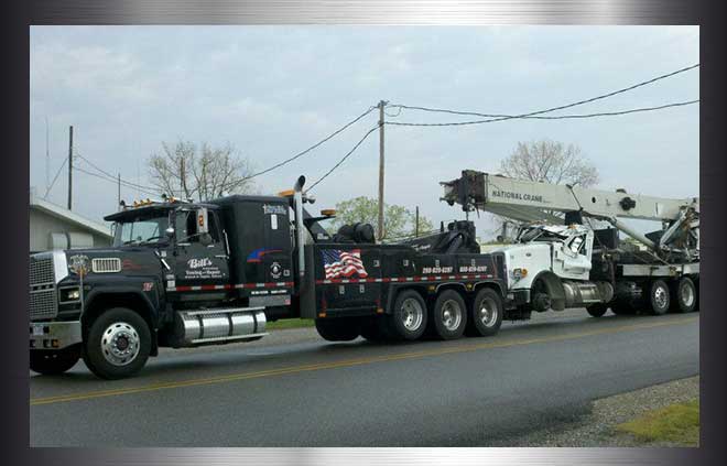 tow truck towing electric truck